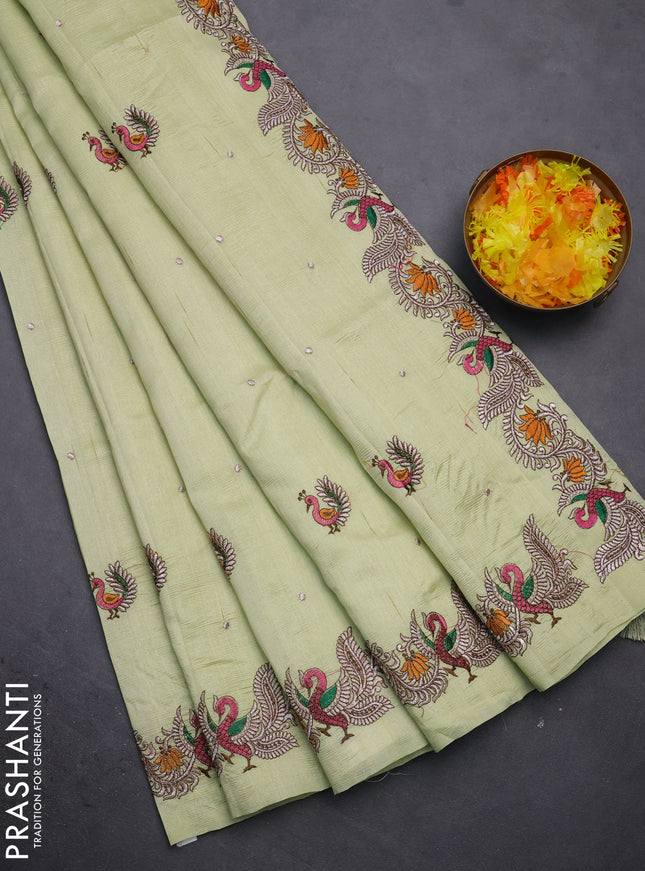 Semi raw silk saree mild pista green with embroidery work buttas and annam design embroidery border