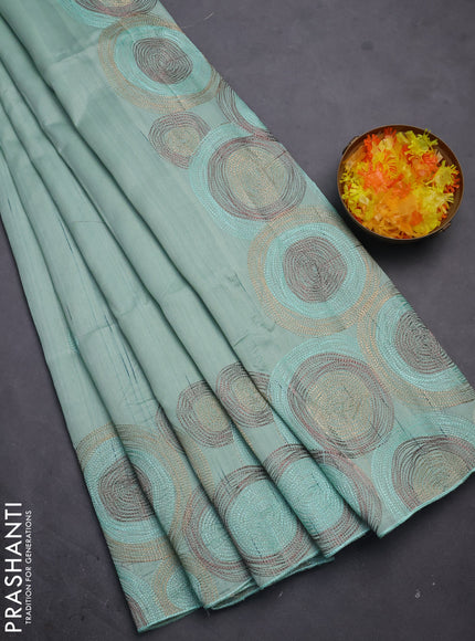 Semi raw silk saree pastel green with embroidery work buttas and geometric design embroidery border