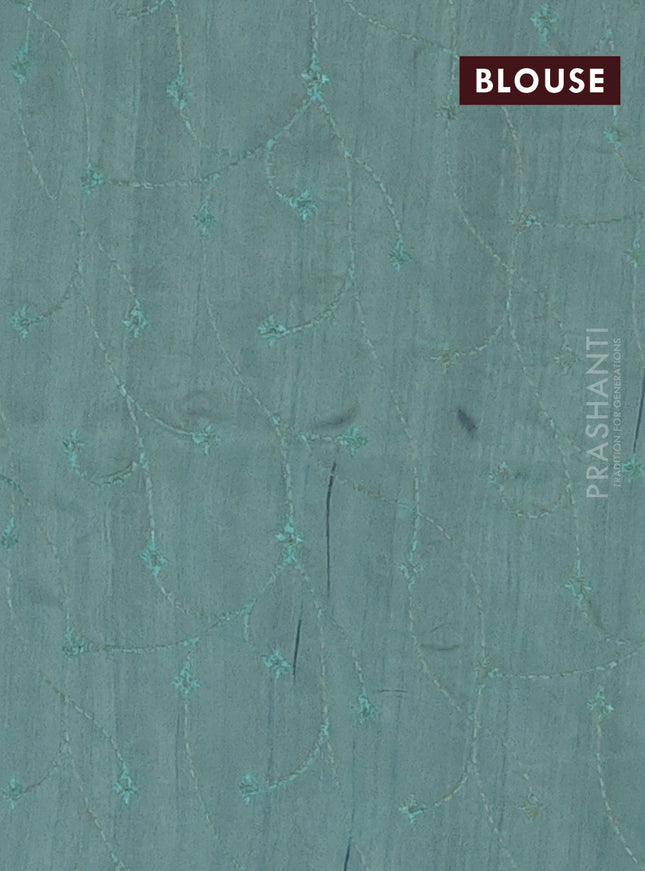 Semi raw silk saree pastel green with embroidery work buttas and geometric design embroidery border