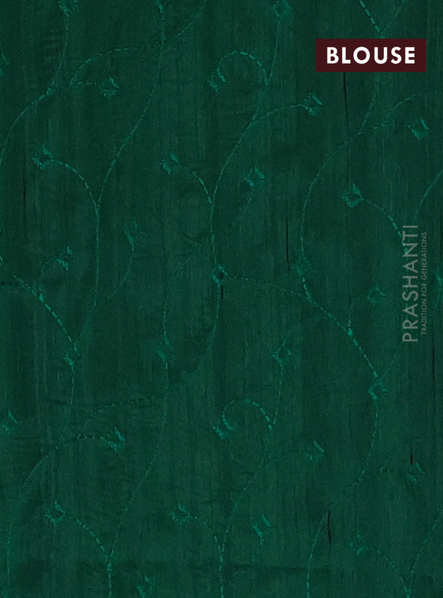 Semi raw silk saree green with embroidery work buttas and geometric design embroidery border