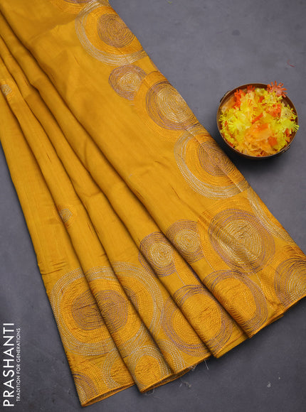 Semi raw silk saree mustard yellow with embroidery work buttas and geometric design embroidery border