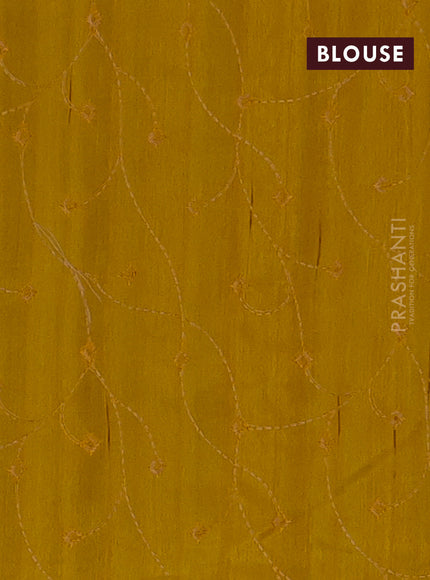 Semi raw silk saree mustard yellow with embroidery work buttas and geometric design embroidery border
