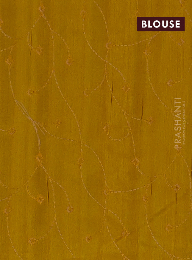 Semi raw silk saree mustard yellow with embroidery work buttas and geometric design embroidery border