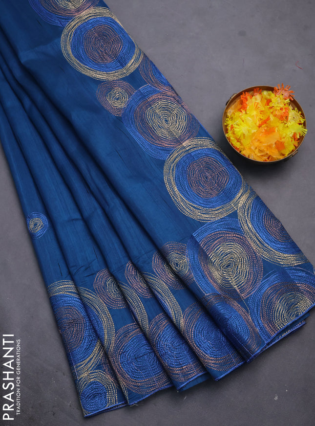 Semi raw silk saree peacock blue with embroidery work buttas and geometric design embroidery border
