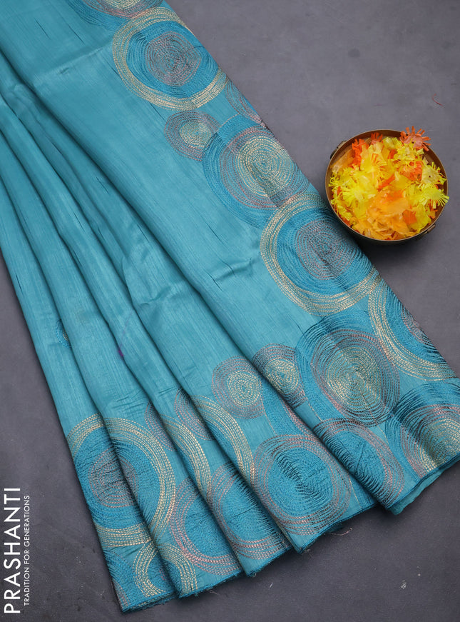 Semi raw silk saree teal green shade with embroidery work buttas and geometric design embroidery border