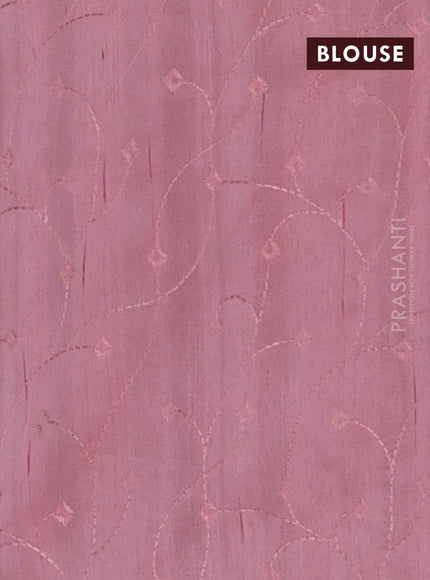 Semi raw silk saree peach shade with embroidery work buttas and geometric design embroidery border