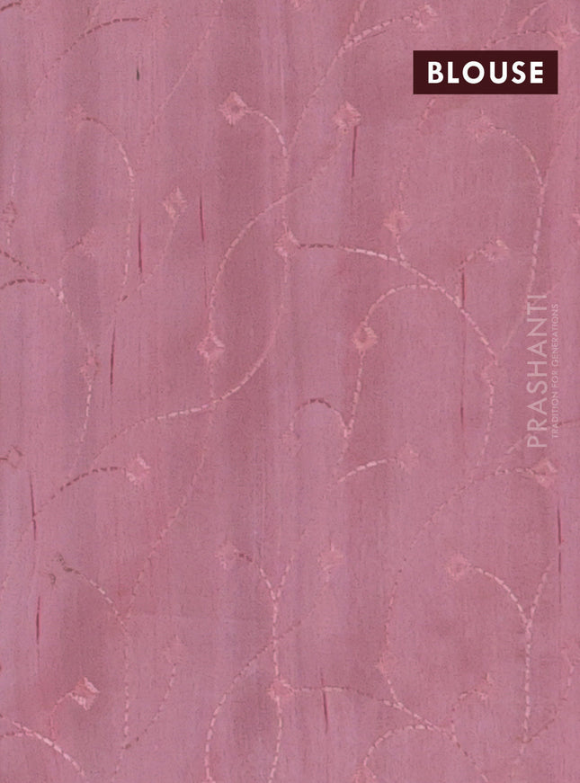 Semi raw silk saree peach shade with embroidery work buttas and geometric design embroidery border