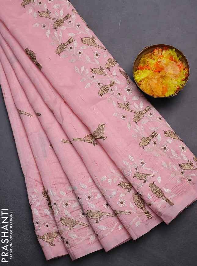 Semi raw silk saree peach shade with embroidery work buttas and embroidery border