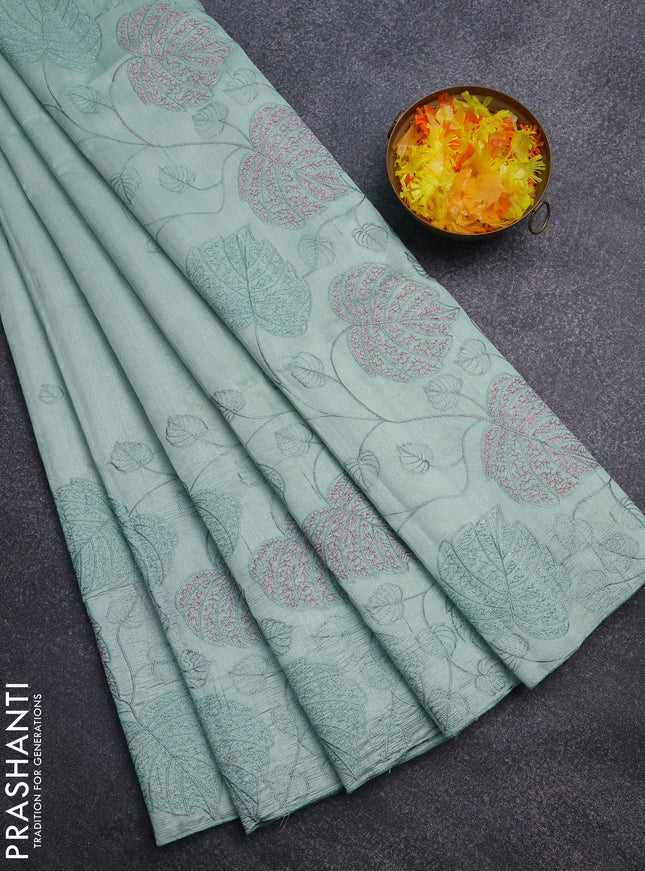 Semi raw silk saree pastel green with allover embroidery and leaf design embroidery border