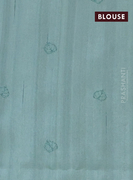 Semi raw silk saree pastel green with allover embroidery and leaf design embroidery border