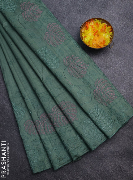 Semi raw silk saree green shade with allover embroidery and leaf design embroidery border