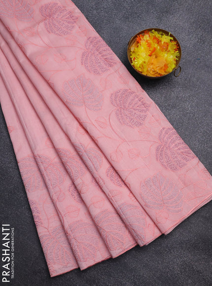 Semi raw silk saree peach shade with allover embroidery and leaf design embroidery border