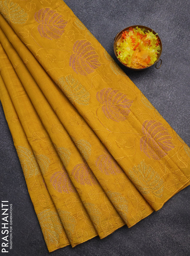 Semi raw silk saree mustard yellow with allover embroidery and leaf design embroidery border