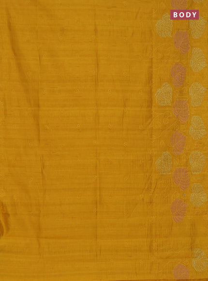 Semi raw silk saree mustard yellow with allover embroidery and leaf design embroidery border