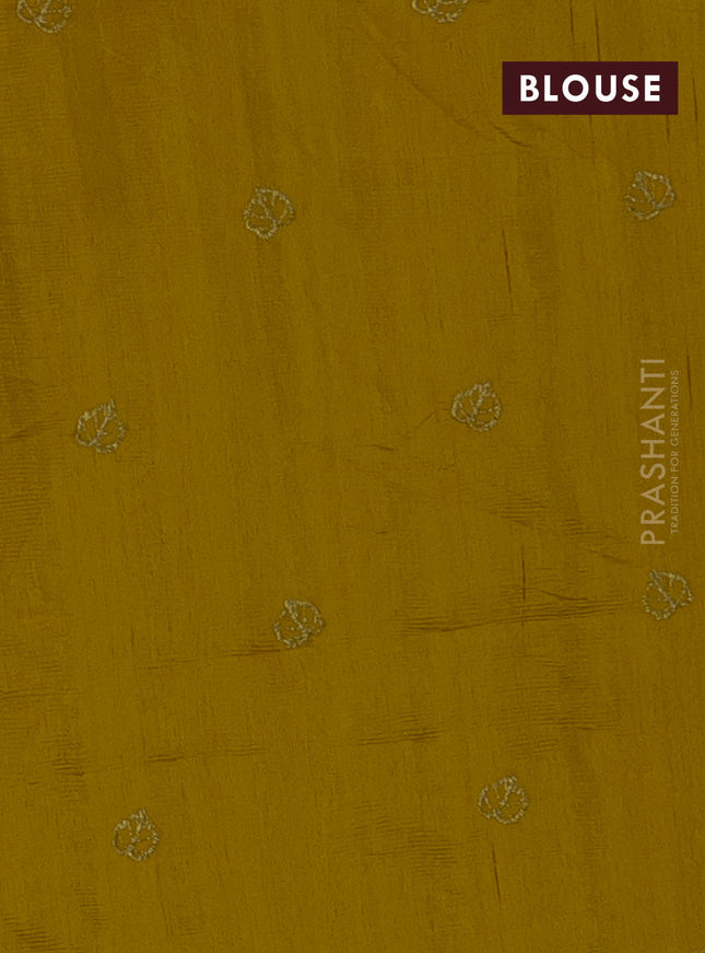 Semi raw silk saree mustard yellow with allover embroidery and leaf design embroidery border