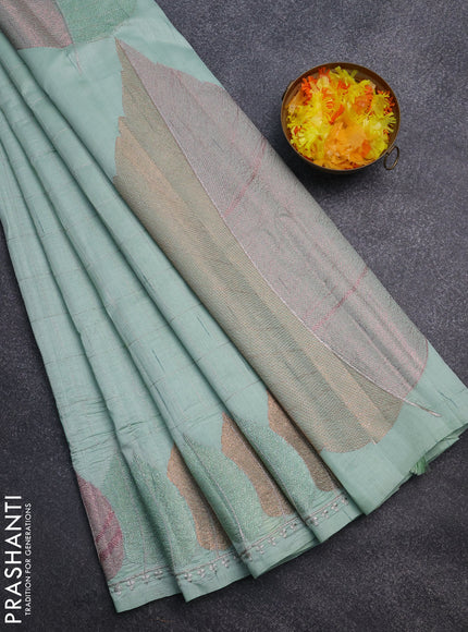 Semi raw silk saree pastel green with zari checked pattern and embroidery leaf butta border