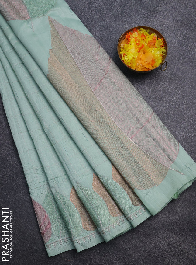 Semi raw silk saree pastel green with zari checked pattern and embroidery leaf butta border