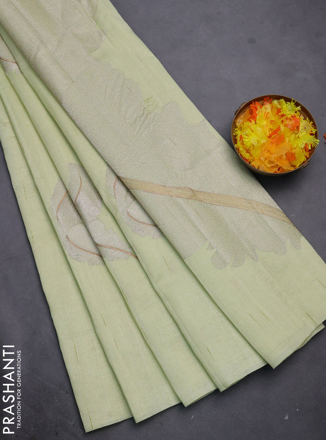 Semi raw silk saree pista green with embriodery leaf buttas and embroidery leaf butta border