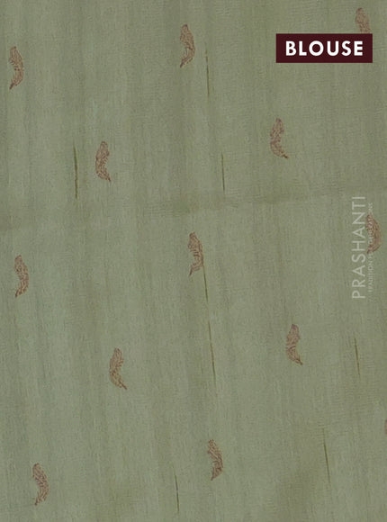 Semi raw silk saree pista green with embriodery leaf buttas and embroidery leaf butta border