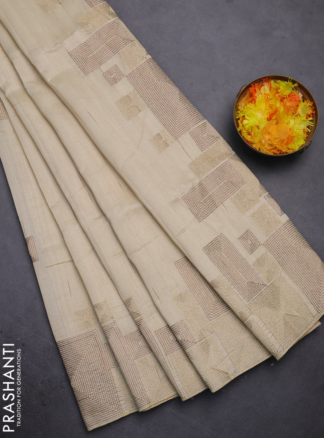 Semi raw silk saree cream with embroidery work buttas and geometric design embroidery border