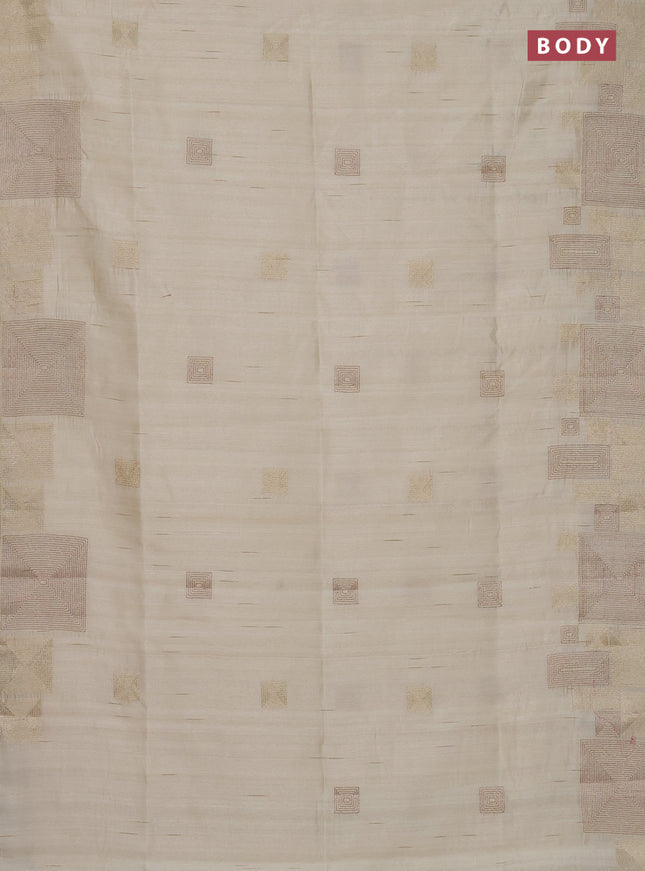 Semi raw silk saree cream with embroidery work buttas and geometric design embroidery border