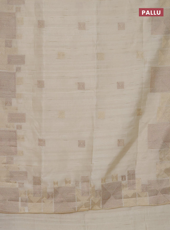 Semi raw silk saree cream with embroidery work buttas and geometric design embroidery border