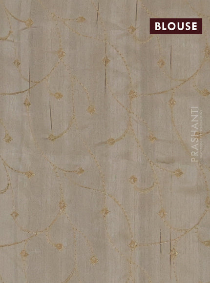 Semi raw silk saree cream with embroidery work buttas and geometric design embroidery border