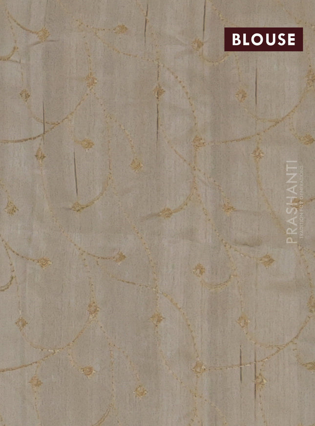 Semi raw silk saree cream with embroidery work buttas and geometric design embroidery border