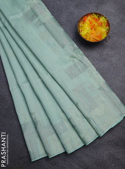 Semi raw silk saree pastel green with embroidery work buttas and geometric design embroidery border