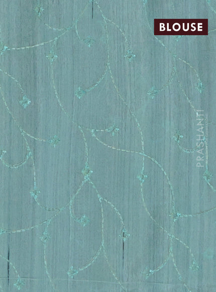 Semi raw silk saree pastel green with embroidery work buttas and geometric design embroidery border