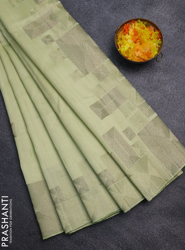 Semi raw silk saree pista green with embroidery work buttas and geometric design embroidery border