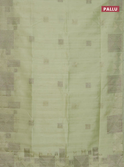 Semi raw silk saree pista green with embroidery work buttas and geometric design embroidery border