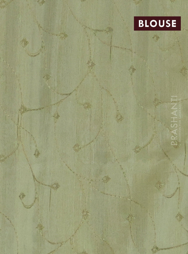 Semi raw silk saree pista green with embroidery work buttas and geometric design embroidery border