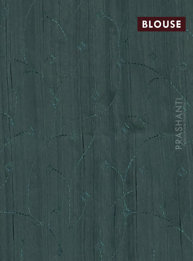 Semi raw silk saree green shade with embroidery work buttas and geometric design embroidery border