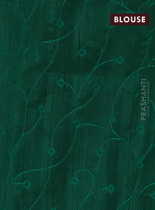 Semi raw silk saree green with embroidery work buttas and geometric design embroidery border