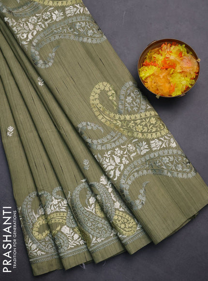 Semi raw silk saree sap green with embroidery work buttas and paisley design embroidery border