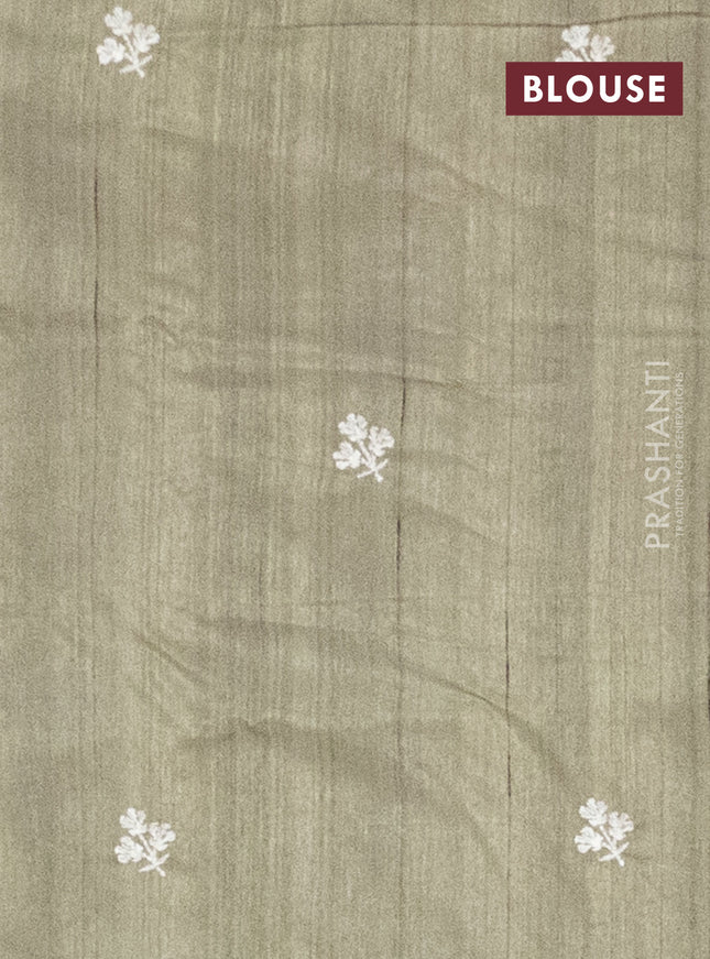 Semi raw silk saree pastel green with embroidery work buttas and floral embroidery border