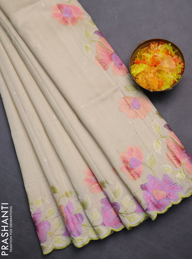 Semi raw silk saree cream with embroidery work buttas and floral embroidery border