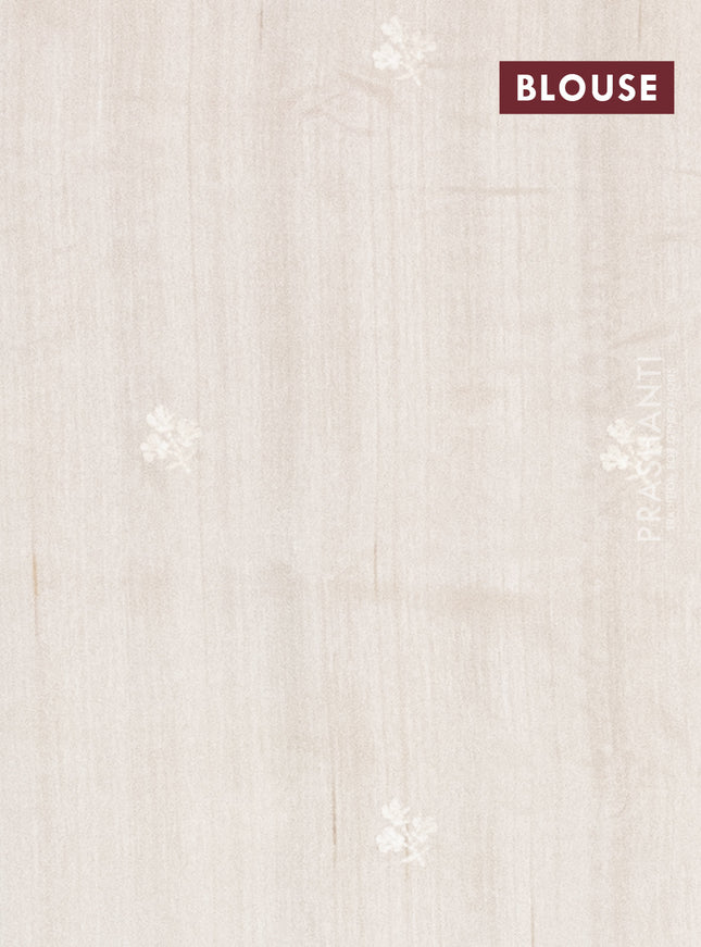 Semi raw silk saree cream with embroidery work buttas and floral embroidery border