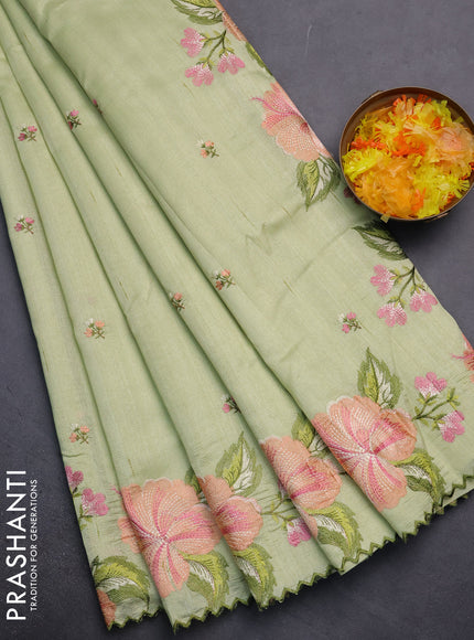 Semi raw silk saree pista green with embroidery work buttas and floral embroidery border
