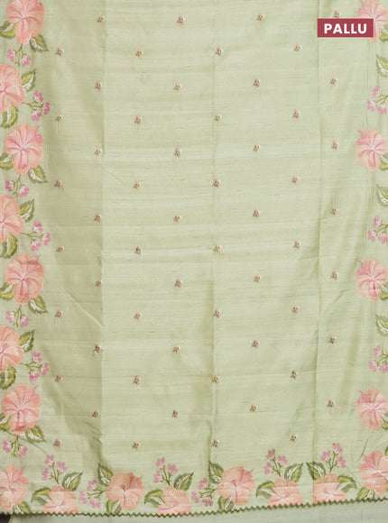 Semi raw silk saree pista green with embroidery work buttas and floral embroidery border