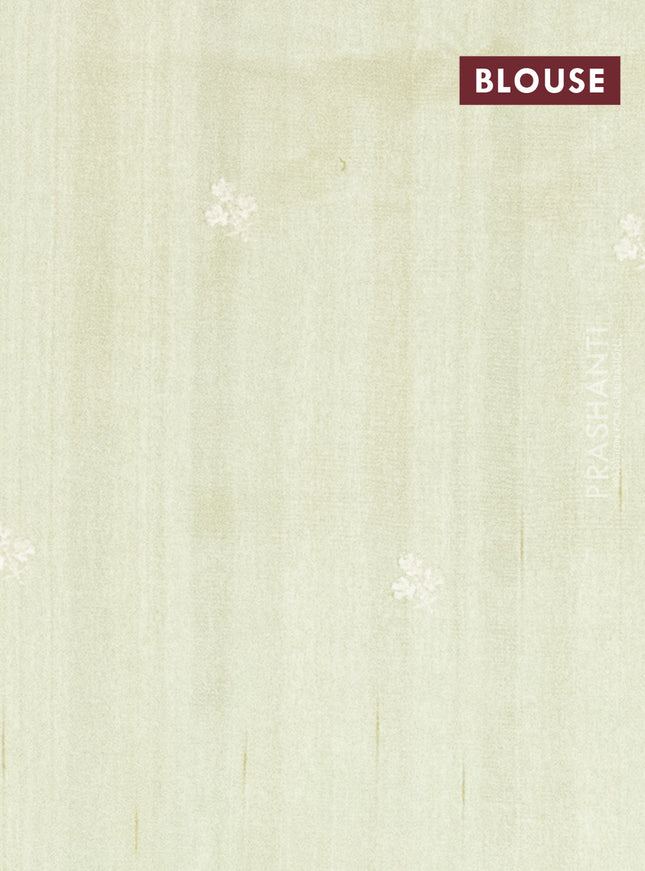 Semi raw silk saree pista green with embroidery work buttas and floral embroidery border