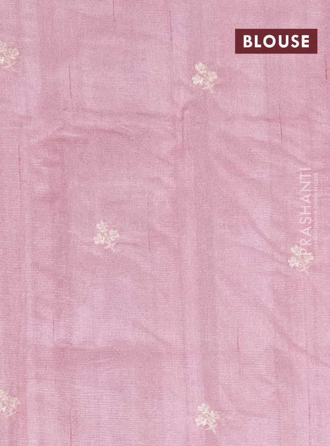Semi raw silk saree peach shade with embroidery work buttas and floral embroidery border
