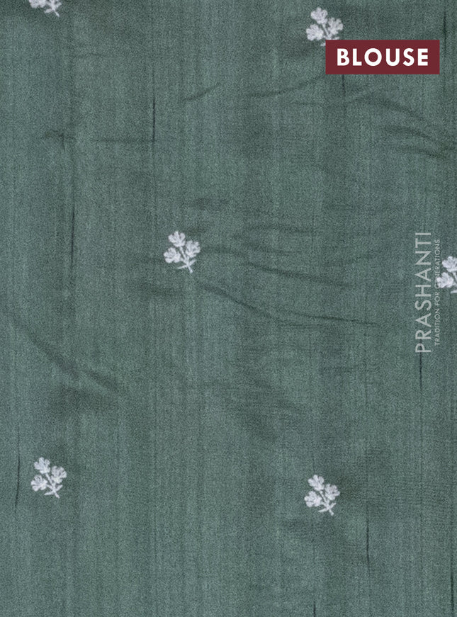 Semi raw silk saree green shade with embroidery work buttas and floral embroidery border