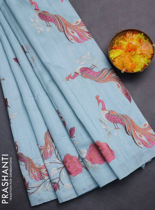 Semi raw silk saree pastel blue with embroidery work buttas and peacock embroidery border