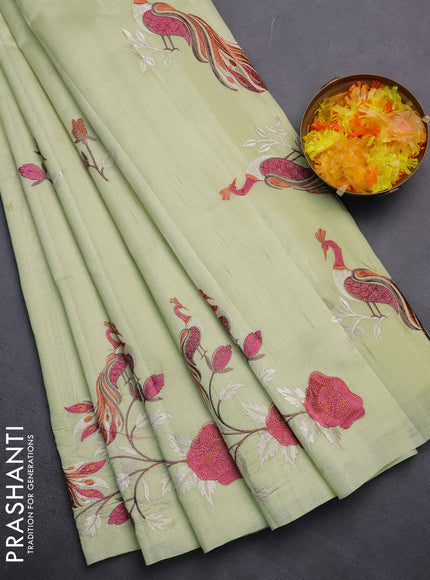 Semi raw silk saree pista green with embroidery work buttas and peacock embroidery border