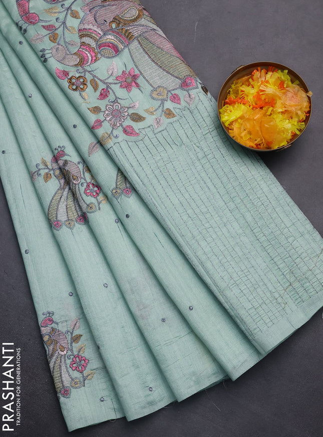 Semi raw silk saree pastel green with embroidery work buttas and peacock embroidery butta border