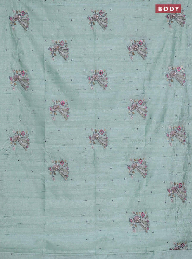 Semi raw silk saree pastel green with embroidery work buttas and peacock embroidery butta border