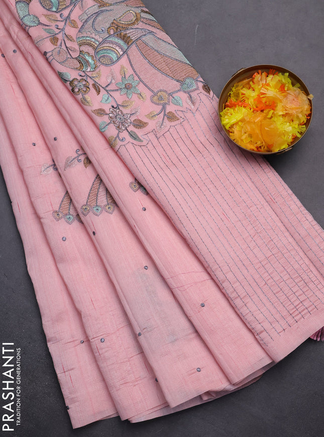 Semi raw silk saree peach shade with embroidery work buttas and peacock embroidery butta border