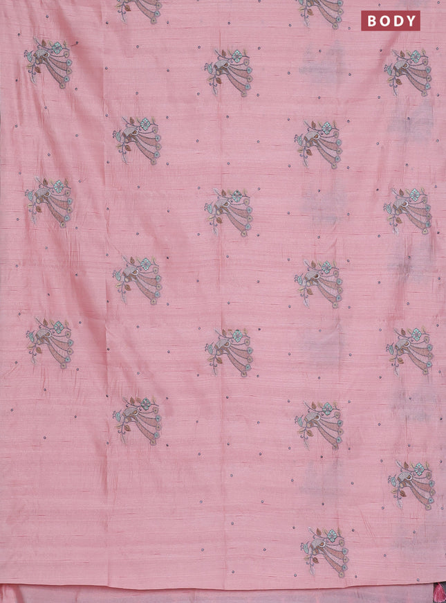 Semi raw silk saree peach shade with embroidery work buttas and peacock embroidery butta border